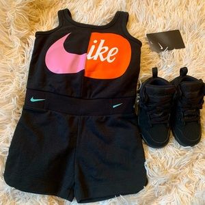 Nike one piece toddler outfit.